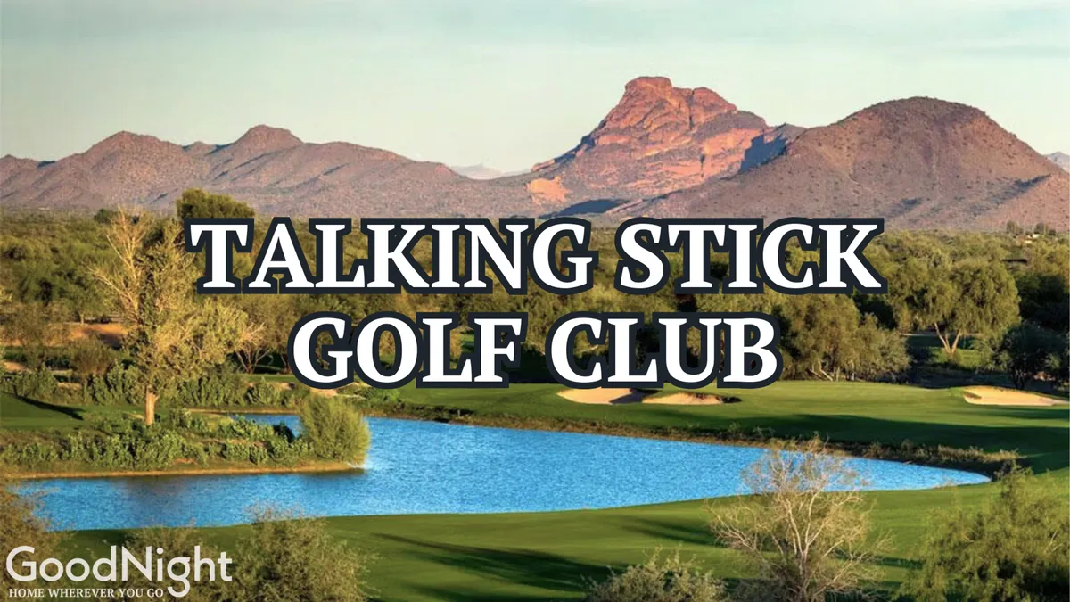 A beautifully maintained golf course stretches across lush greenery, bordered by a calm lake and backdropped by a range of impressive mountains. The early morning sunlight creates a serene and inviting atmosphere, ideal for a relaxing round of golf or simply unwinding by the water after a game.